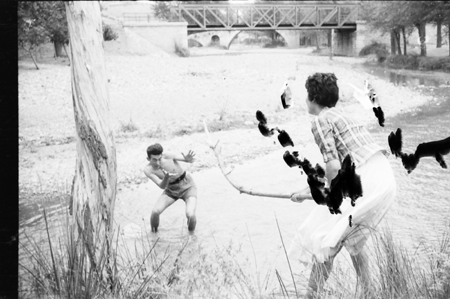 Hombres en el rÃ­o. Luco.