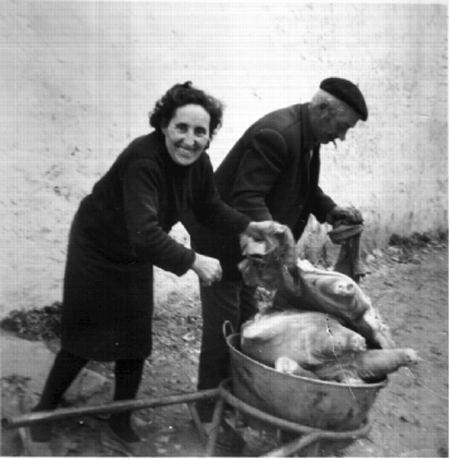 Pareja con las piezas de matanza. Pozuel