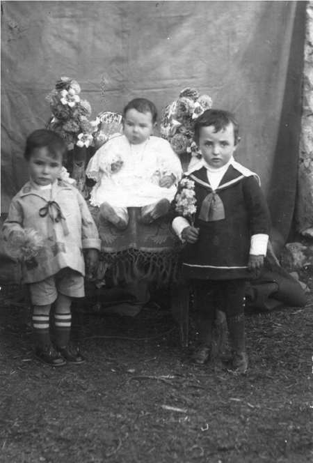 Retrato de tres niÃ±os de Villarquemado.