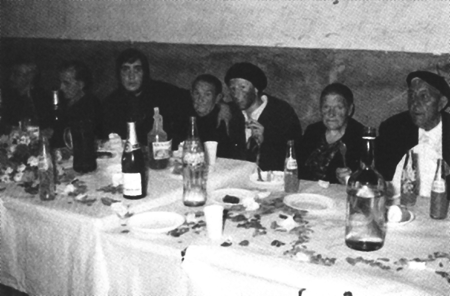 Vecinos de RetascÃ³n en una celebraciÃ³n.