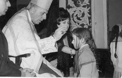 Comulgando con velo. BaÃ±Ã³n.